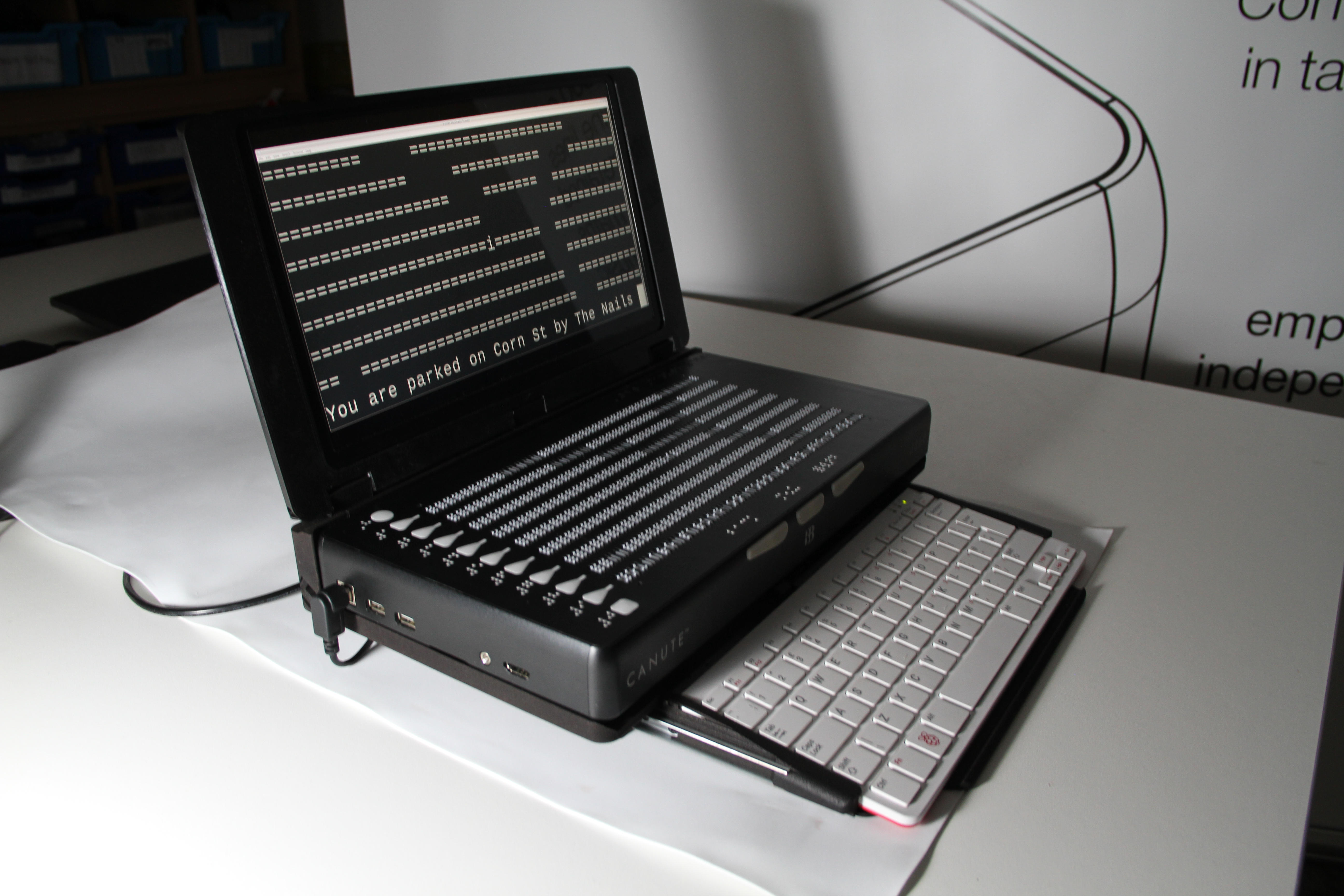 A photo of the Canute Console with a tactile Map of Corn Street, Bristol.
